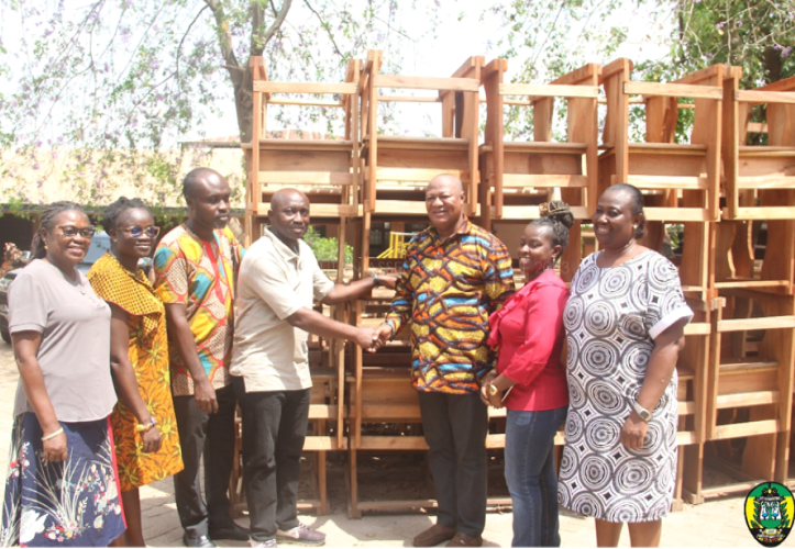 Hon. Sam Pyne Presenting the desks to the school. 