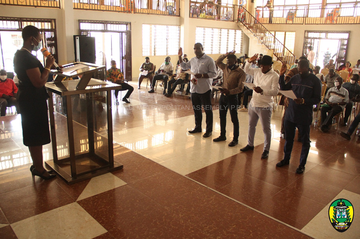 Her Worship Patricia Quansah, a High Court Judge swearing in members at Subin Sub Metro District Council.