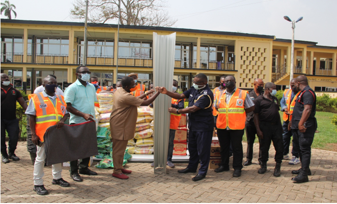 NADMO DIRECTOR-GENERAL PRESENTS RELIEF ITEMS TO ASHANTI REGIONAL POLICE COMMAND AND OTHERS